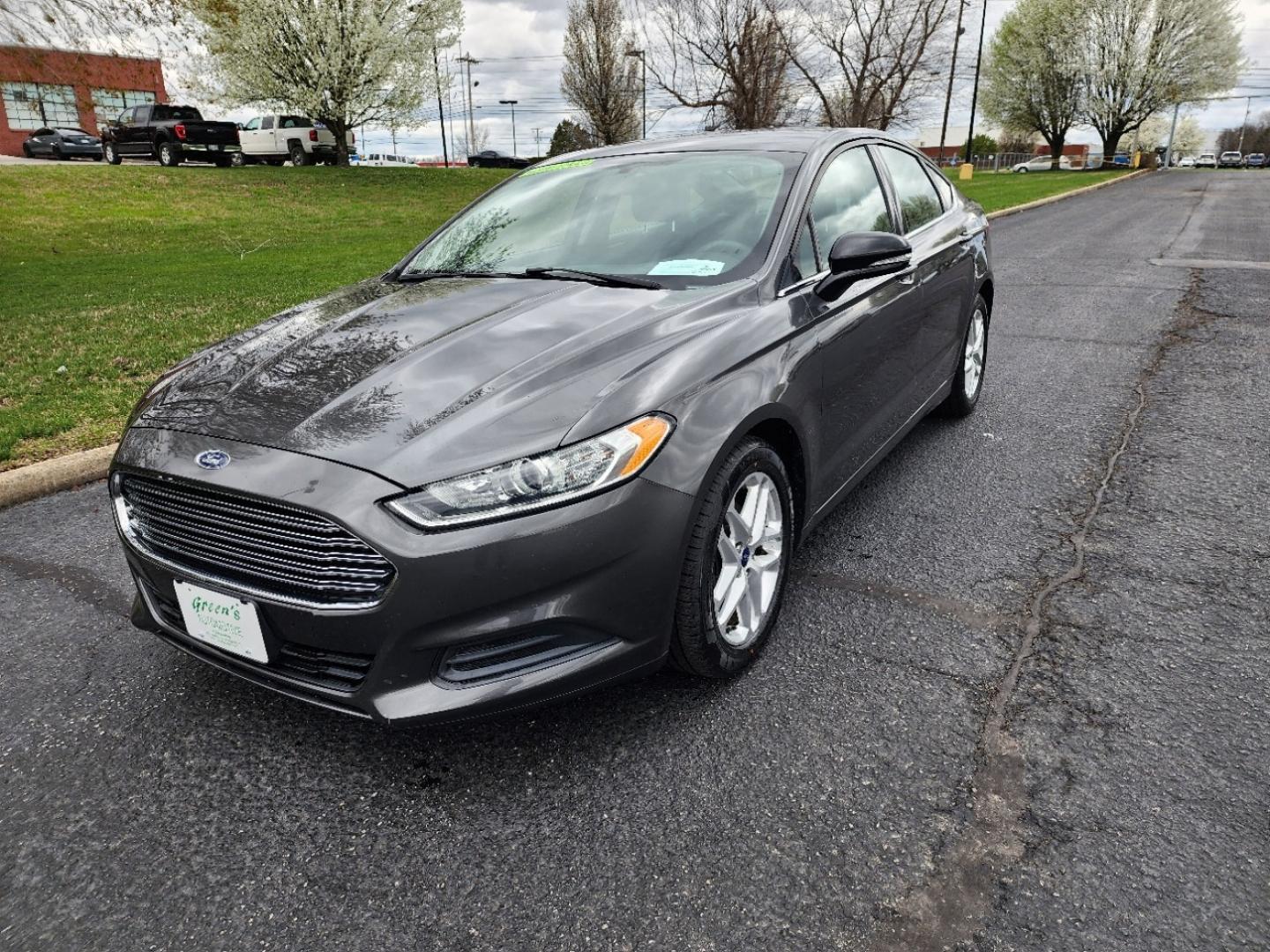 2015 Gray /Gray Ford Fusion SE (3FA6P0HD0FR) with an 1.5L L4 DOHC 16V engine, Automatic transmission, located at 1221 Madison St., Shelbyville, TN, 37160, (931) 680-9439, 0.000000, 0.000000 - Photo#0